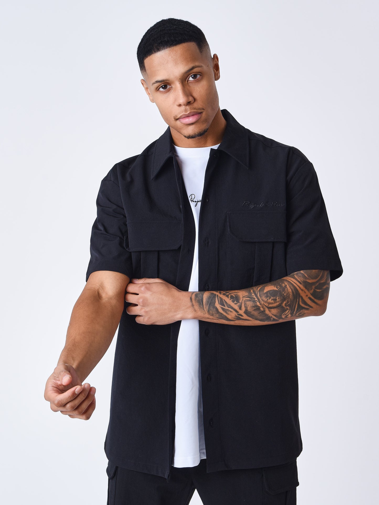 CAMISA DE MANGA CORTA CON TEXTURA ESTILO CARGO - NEGRO - PROJECT X PARIS | 2310034_BK1