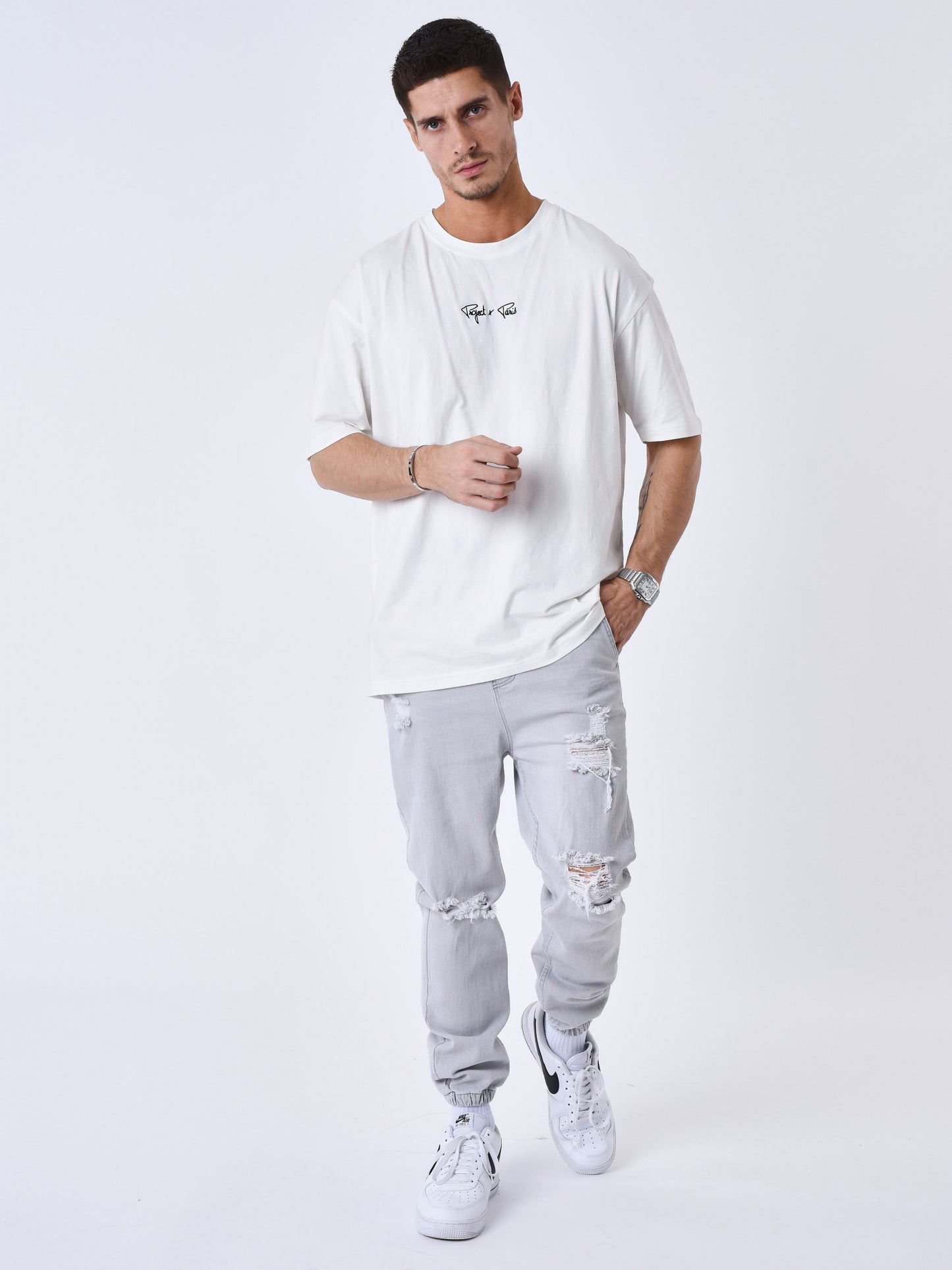 VAQUEROS ESTILO JOGGER ROTO - GRIS CLARO - PROJECT X PARIS | T239010_GY