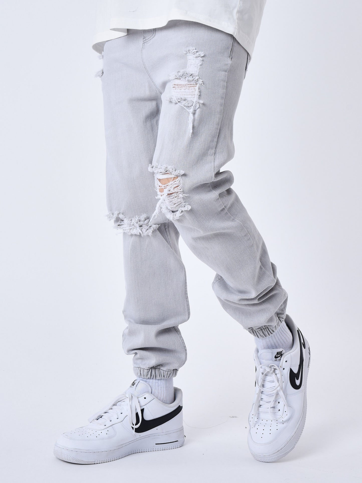 VAQUEROS ESTILO JOGGER ROTO - GRIS CLARO - PROJECT X PARIS | T239010_GY