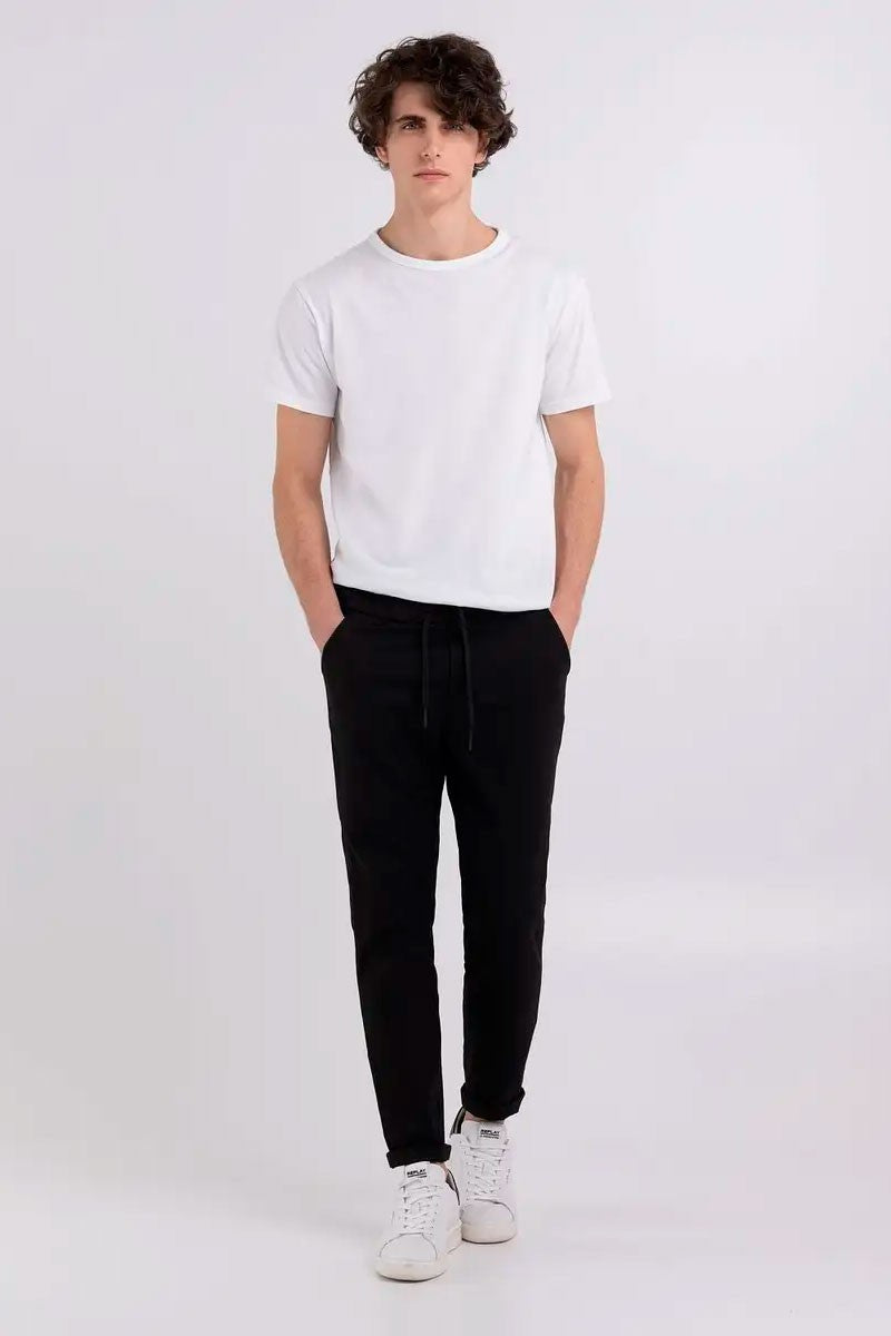 PANTALÓN CHINO SLIM FIT CINTURA ELÁSTICA - NEGRO - REPLAY | M9953.000.84617