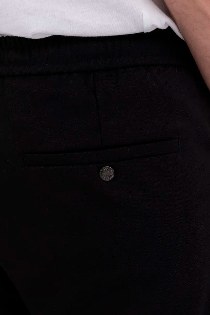 PANTALÓN CHINO SLIM FIT CINTURA ELÁSTICA - NEGRO - REPLAY | M9953.000.84617